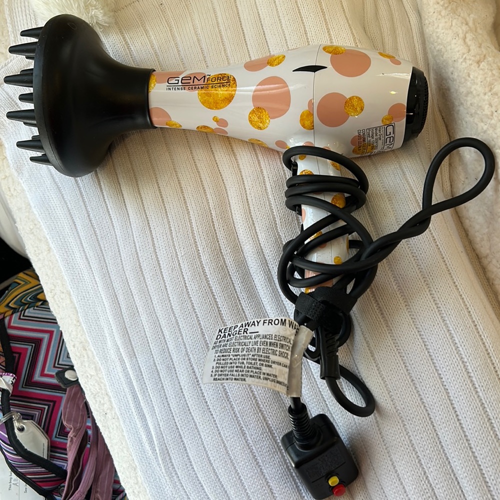 Hair dryer with attached piece